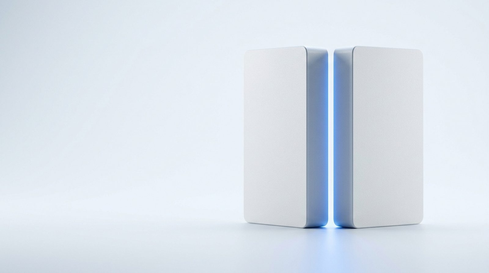 Comparing two IPTV providers side by side, shown as two identical devices under studio light