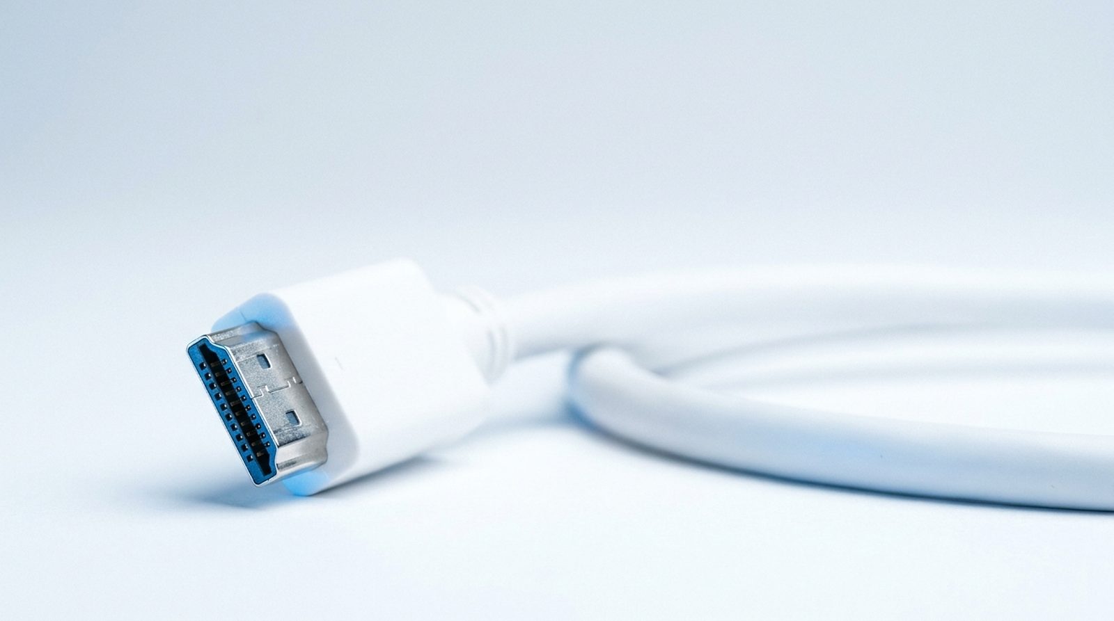 Diagnosing an IPTV fault, shown as an HDMI connector under precise studio light